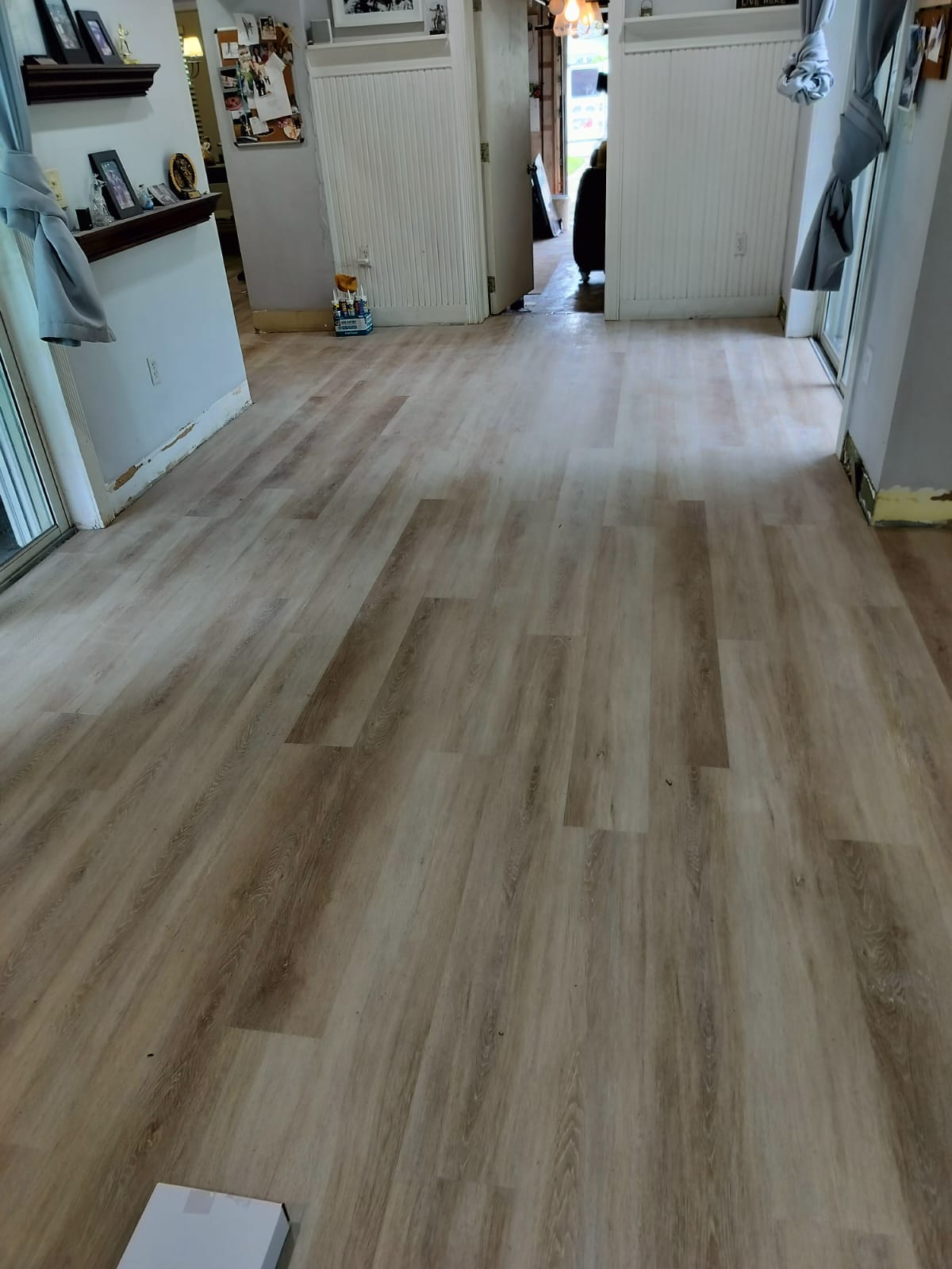 Living area with whole-home vinyl plank installation