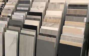 Rows of tile slabs on display in the showroom